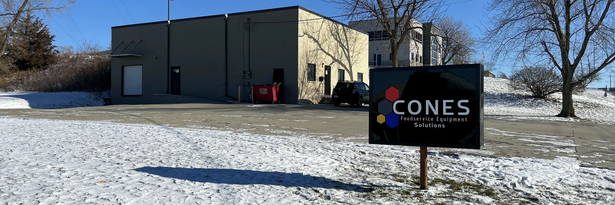 The CONES Solutions branch at Cedar Rapids, IA, with service vans outside