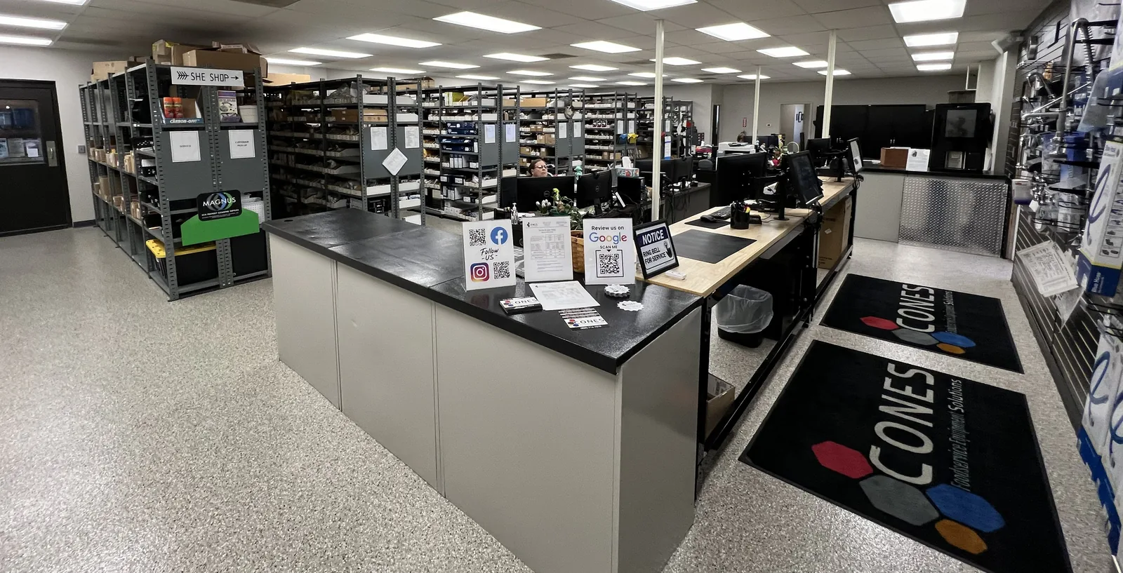 The parts counter at the CONES Solutions Moline branch, with stocked shelving behind it